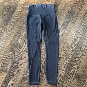 Lululemon Gray Leggings. Size 4. Have light horizontal lines through the grey.